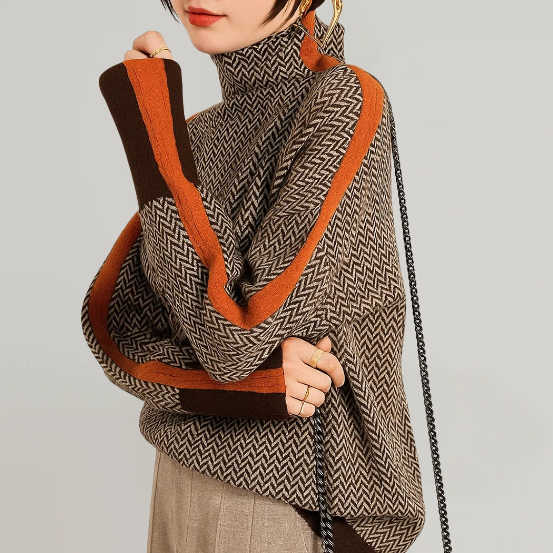 Orange sweater med høj krave og kontraststriber, tæt på