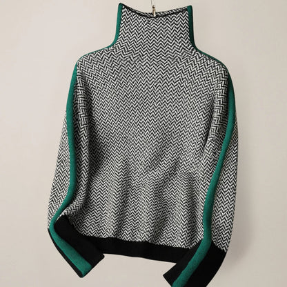 Grøn sweater med høj krave til dame lagt fladt